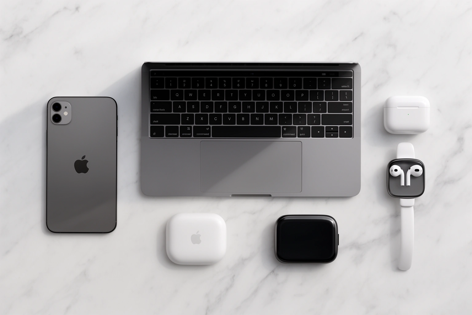 Everything Apple DigitalRGS — Apple ecosystem of iPhone Mac iPad Apple Watch and AirPods arranged together
